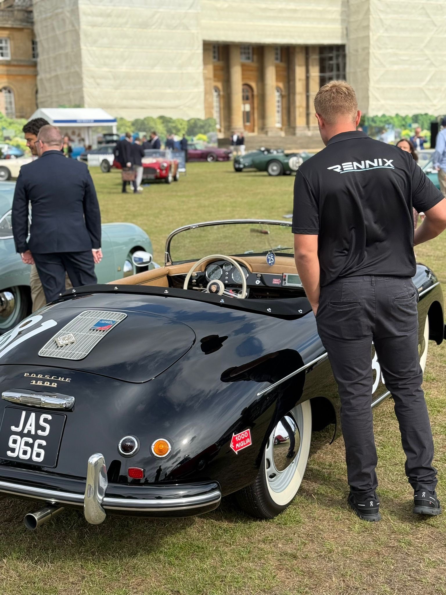 Classic Porsche 1600 with a Rennix team member at a car event; specialist automotive experience behind Rennix Automotive storage in Nottinghamshire